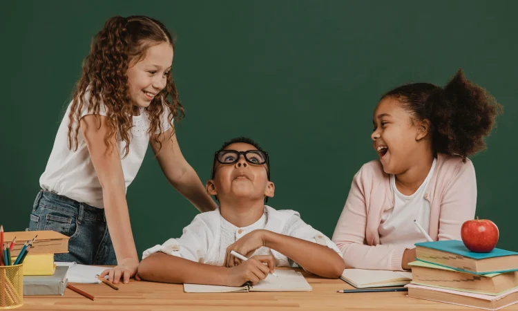 school kids laughing together at Preschool in Marriottsville, Maryland